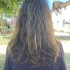 Cheveux châtaines épaisses ondulées